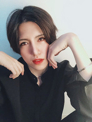 ni~
